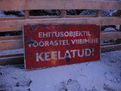Warning sign near a hole