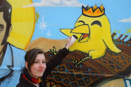 Emily Horn and a mural