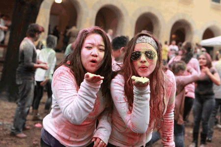 Animated GIF of paint-blowing at a Holi celebration