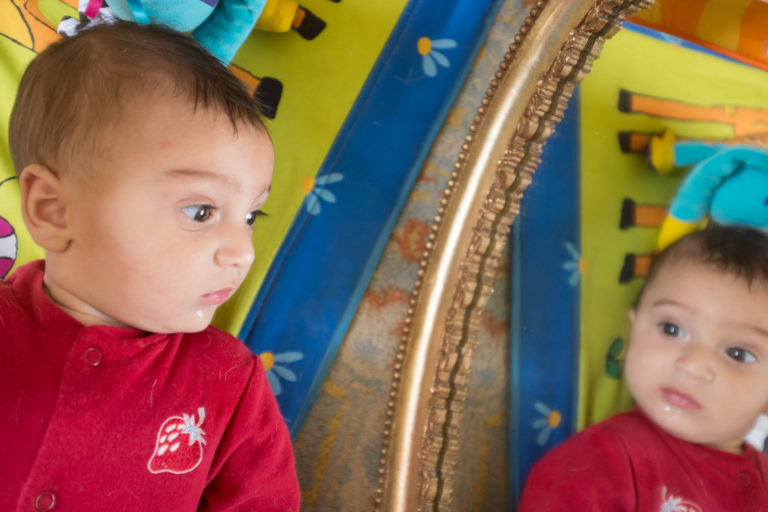 Mirror test a sibilant intake of breath