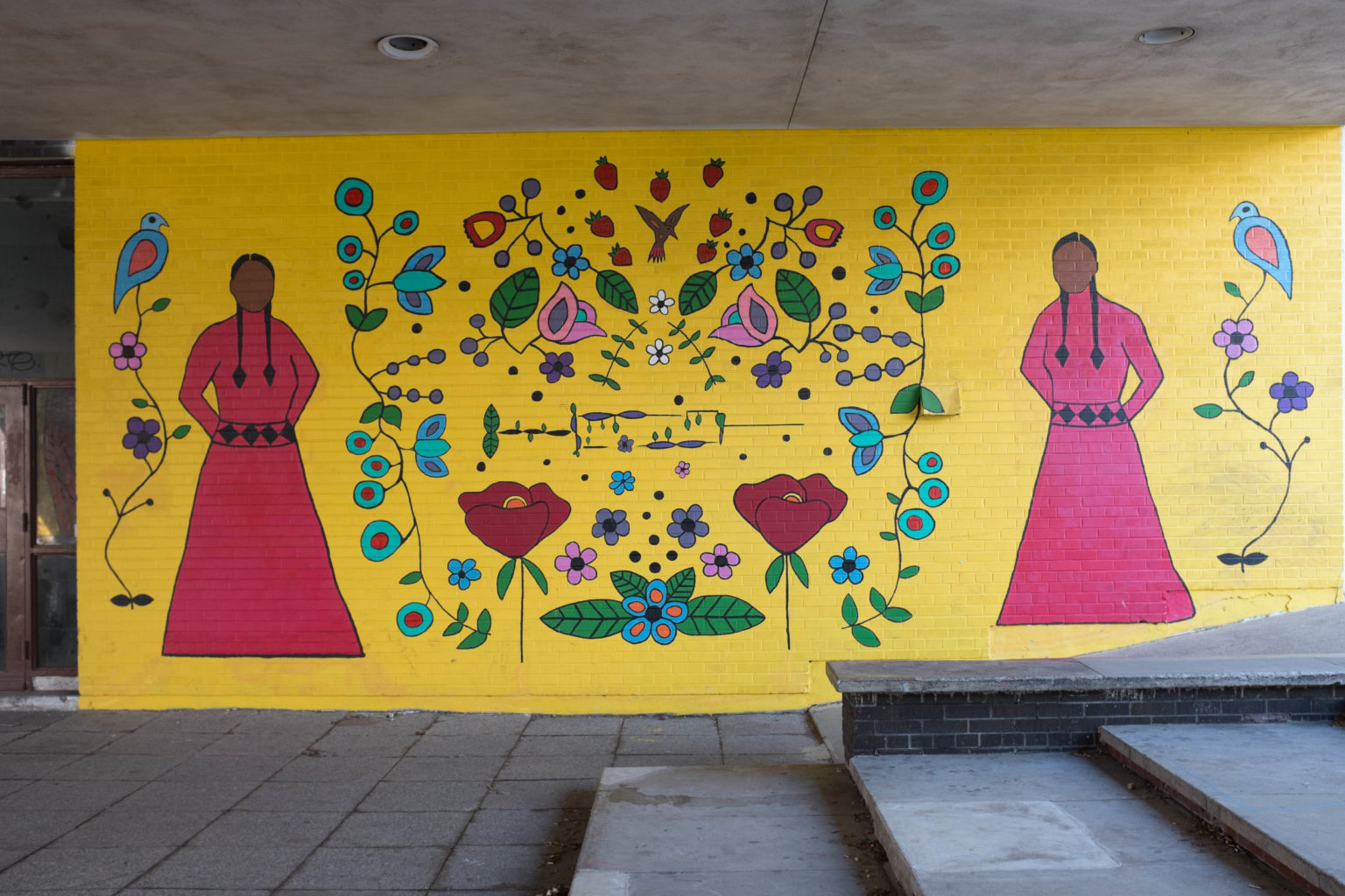 Indigenous mural a sibilant intake of breath